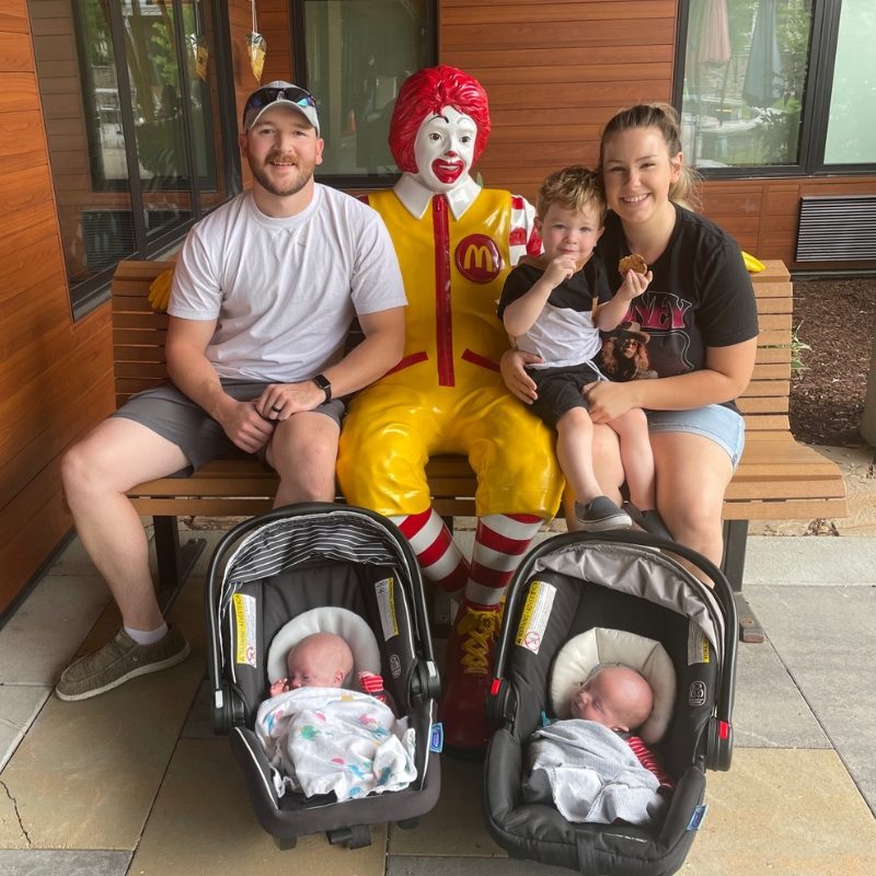 Family Sitting with Ronald on Bench